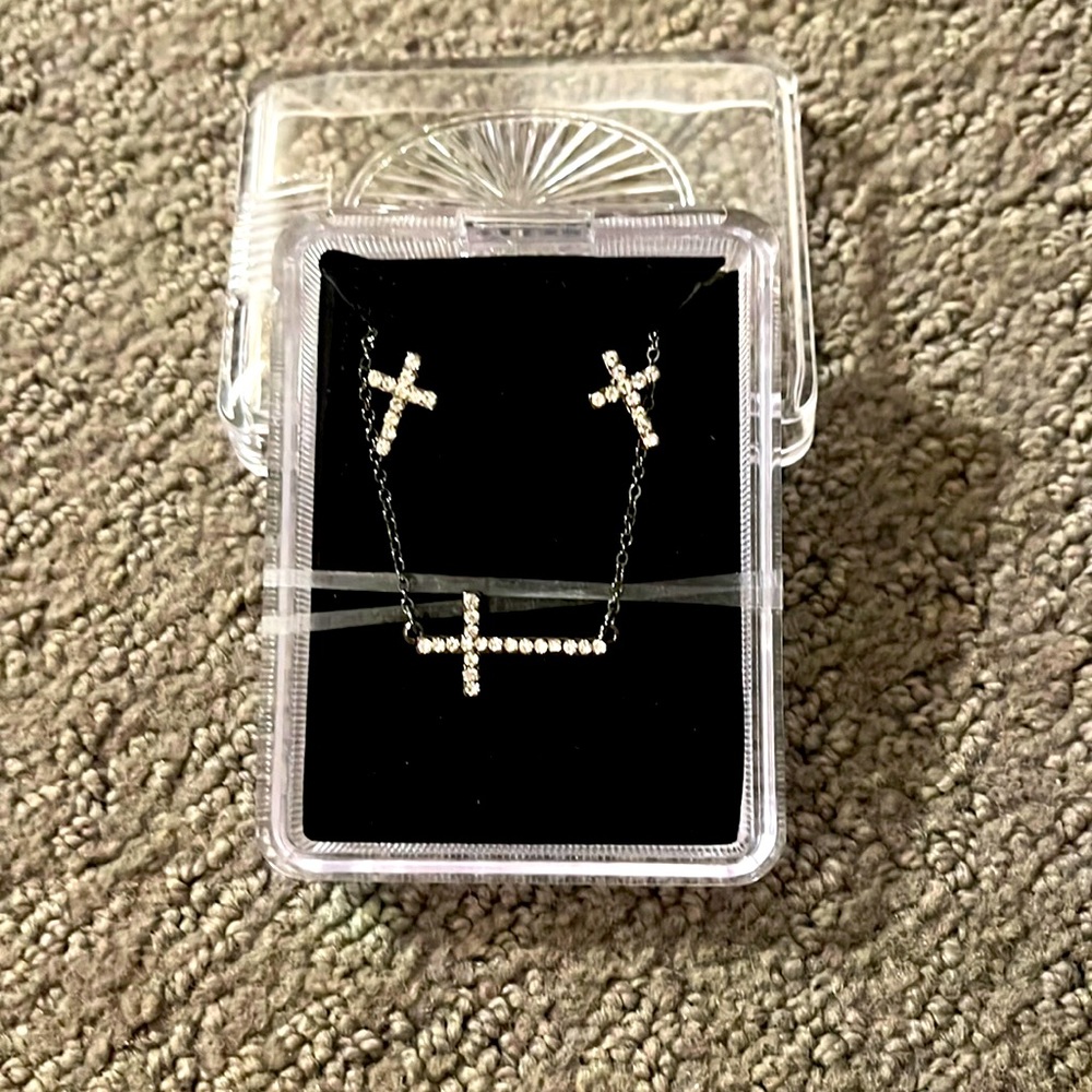 Pierced earring ‘ diamond’ cross earrings and necklace for a child.